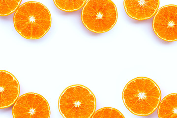 High vitamin C,  Frame made of Juicy orange fruit on white