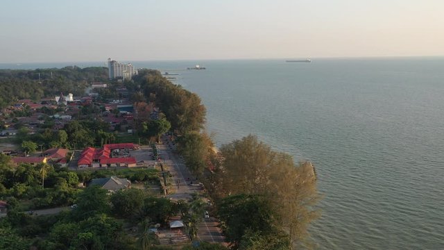 4k cinematic b-roll drone shot of flying above Pantai Puteri, famous beach at Melaka, Malaysia. 