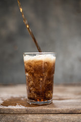 Ice cubes with soft drink.