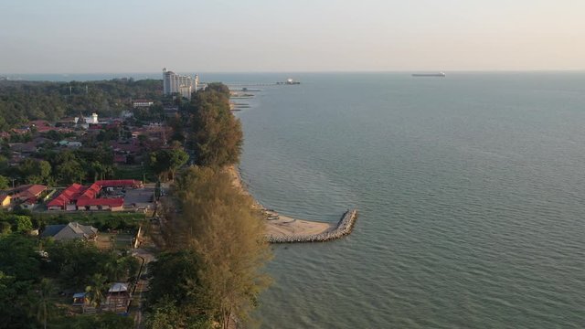 4k cinematic b-roll drone shot of flying above Pantai Puteri, famous beach at Melaka, Malaysia. 