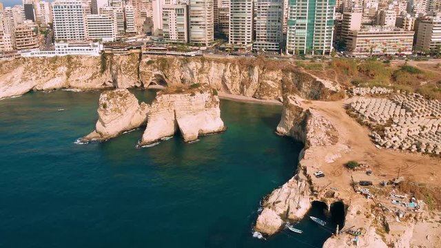 Roucheh rocks in Beirut, Lebanon in the sea in 4K quality, Pigeon Rocks in Mediterranean sea.
