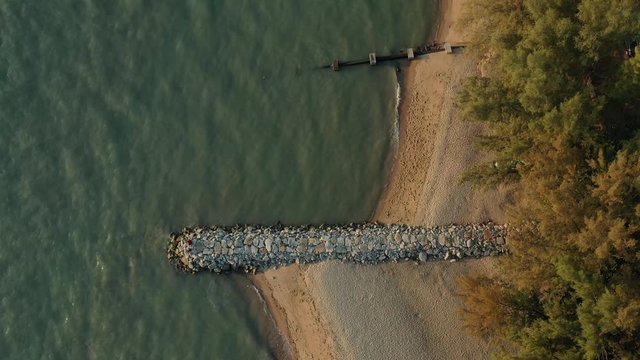 4k cinematic b-roll drone shot of flying above Pantai Puteri, famous beach at Melaka, Malaysia. 