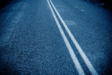 Local details of asphalt road, blue tone