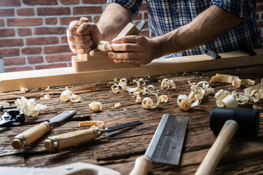 Carpenter Using Jack-plane