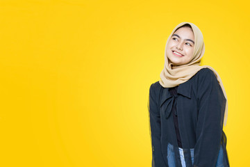 Portrait of Asian women with happy face on yellow background