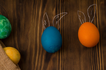 Easter eggs on rustic wooden background