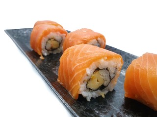 Japanese food style, Top view of salmon roll isolated on white background, Ready to eat or serve
