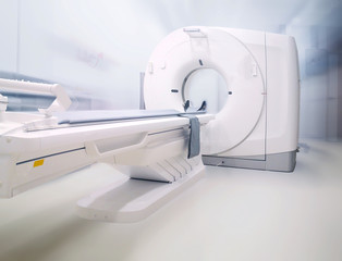 Multi detector CT Scanner ( Computed Tomography )on blurred hospital room  background.