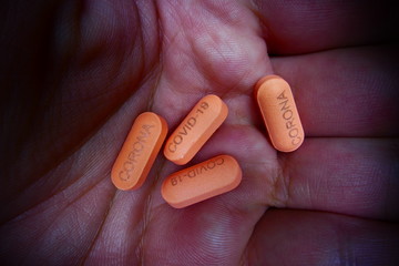 CORONA COVID-19 virus caption on pill cure medicine