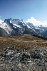 Beautiful Swiss Alps Mountains and clouds in the Summer