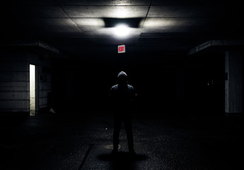 Fototapeta na wymiar man in the dark background