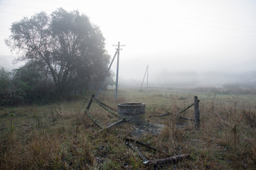 The village on an early foggy morning, a beautiful landscape of the countryside at dawn.