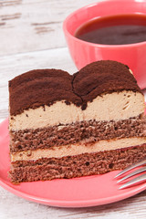 Tasty creamy tiramisu cake and black coffee for different occasions. Delicious dessert