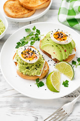 Sandwich with avocado and boiled egg. Healthy breakfast. 