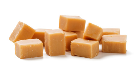 Caramel candies isolated on white background.