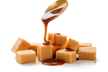 Caramel candies isolated on white background.