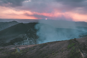 Sunset over volcano crater