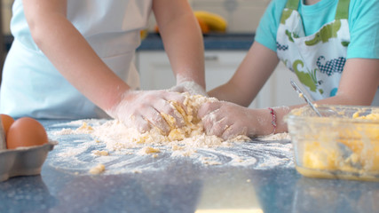 Two children cooking together