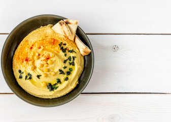 Hummus on a white background. Pete. Recipes. Vegetarian food. Healthy eating.