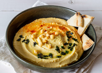 Hummus on a white background. Pete. Recipes. Vegetarian food. Healthy eating.