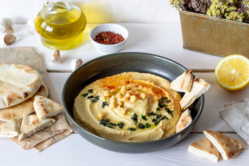 Hummus on a white background. Pete. Recipes. Vegetarian food. Healthy eating.