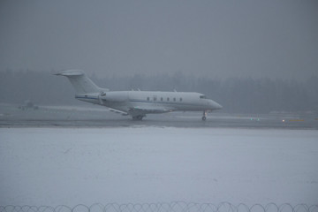 Airplane in hard weather.