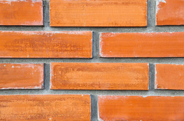 Fototapeta premium Red , brown Brick Stone Wall Concrete Cement horizontal, architecture , construction for hight Quality artwork design rough surface wallpaper background texture.
