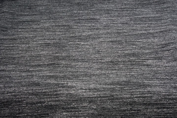 Dark gray color surface cotton fabric  - backdrops texture background of clothing 