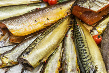 fish smoked mackerel and herring on store counter or fish market