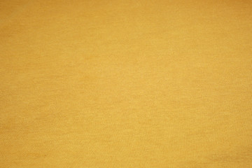 Yellow Mustard surface cotton fabric  - Waving backdrops texture background of clothing 