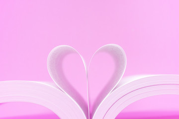 Pink Heart Shape- Create from book on Pink Background - Valentine Day - Love Concept 