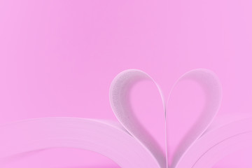 Pink Heart Shape- Create from book on Pink Background - Valentine Day - Love Concept 