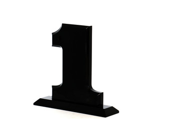Object - Black Trophy of No. 1 Reward For winning the competition - Number one shape isolated on white background