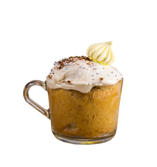 Cupcake for the Easter holiday in a mug with sprinkling and meringue decoration. Isolated on a white background