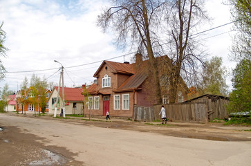PECHORY, RUSSIA - MAY 09, 2010: Wooden construction on Yurievskaya Street. Pskov region