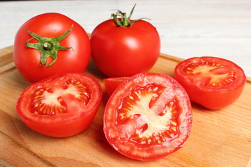 Tomatoes on cutting board