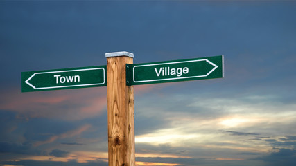 Street Sign to Village versus Town