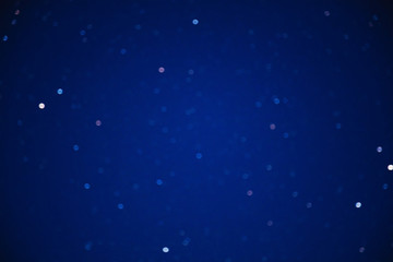 Naklejka na ściany i meble Milky way stars on a dark night sky. Blurred, out of focus image.