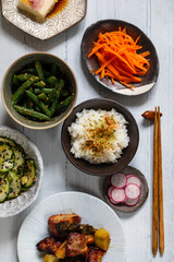 Japanese set meal with rice, tofu, chicken and vegetables