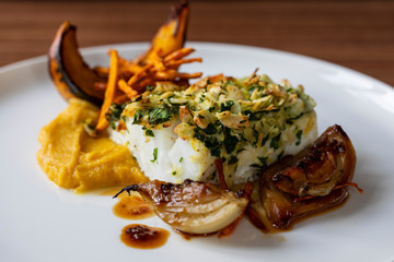 Cod loin in almond crust with pumpkin and fennel