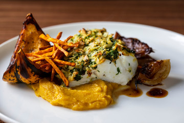 Cod loin in almond crust with pumpkin and fennel