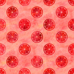 Watercolor sliced ​​grapefruits on coral background. Seamless pattern. Watercolor stock illustration. Design for backgrounds, wallpapers, textile, covers and packaging.