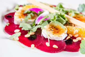Beetroot carpaccio with goat cheese