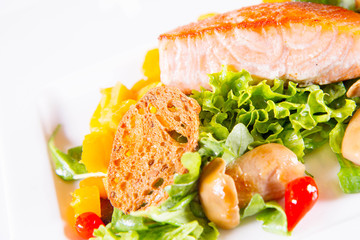 Salmon with salad and mushrooms