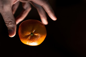 A tangerine before being eaten