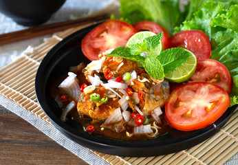 Spicy fish Canned Sardines Salad in black color dish and rice in black bowl (Thai food) but arrange dishes style Japanese