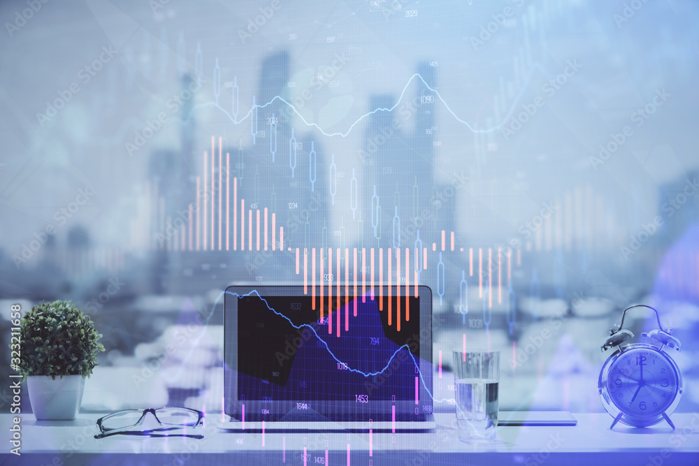 Poster forex graph hologram on table with computer background. multi exposure. concept of financial markets