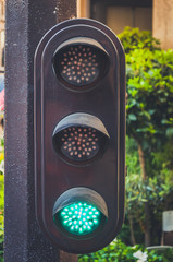 Close up shot of a green traffic light