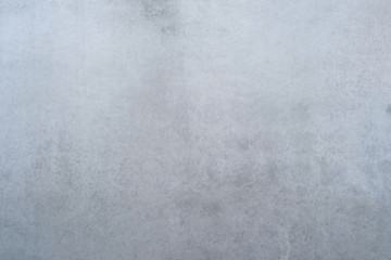 Texture of a smooth gray concrete wall as a background