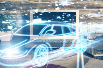 Desktop computer background in office with automobile hologram drawing. Multi exposure. Tech concept.